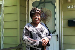 In this June 6, 2018 photo, Alice Holland stands outside the front door of her home in Detroit's Brightmoor neighborhood. Holland likes how things are improving in Detroit five years after the city filed the largest municipal bankruptcy in U.S. history, but says more improvements can be made in city neighborhoods. Holland complains that trash-clogged drains cause some streets in Brightmoor to flood during heavy rains.