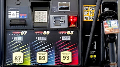 In this June 14, 2018, file photo gasoline prices are displayed on a pump at Sheetz along the Interstate 85 and 40 corridor near Burlington, N.C. On Thursday, July 12, the Labor Department reports on U.S. consumer prices for June.