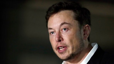 In a Thursday, June 14, 2018 file photo, Tesla CEO and founder of the Boring Company Elon Musk speaks at a news conference, in Chicago. Whether it’s investors betting against his stock, reporters or analysts who ask tough questions or a union trying to organize his workers, Elon Musk has fought back, often around the clock on Twitter. But when Musk called a British diver involved in the Thailand cave rescue a pedophile to 22.3 million Twitter followers on July 15, he may have gone one tweet too far.