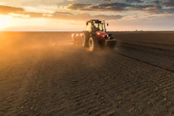 Farmer Planting Crops In Spring