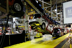 In this Monday, Jan. 28, 2013, file photo, cars move along an assembly line at the General Motors Fairfax plant in Kansas City, Kan. Analysts say that with too many factories making slow-selling cars, General Motors can’t afford to keep them all operating without making some tough decisions.