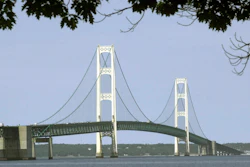 The Mackinac Bridge spans the Straits of Mackinac. A draft of a report commissioned by the state of Michigan outlining a worst-case scenario oil spill from a pipeline in the Straits of Mackinac calculates clean-up, restoration and liability costs at almost $2 billion.