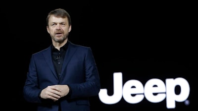In this file photo dated Tuesday, Jan. 16, 2018, Mike Manley, head of Jeep Brand, introduces the 2019 Jeep Cherokee during the North American International Auto Show, in Detroit, USA. Fiat Chrysler's board on Saturday July 20, 2018, has recommended Jeep executive Mike Manley to replace seriously ill CEO Sergio Marchionne.