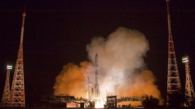 In this photo provided by Roscosmos Space Agency Press Service on Tuesday, July 10, 2018, Russian cargo ship Souz 2,1A takes off from the launch pad at Russia's main space facility in Baikonur, Kazakhstan. A Russian cargo ship has delivered a fresh load of fuel, food, and other supplies for the International Space Station.