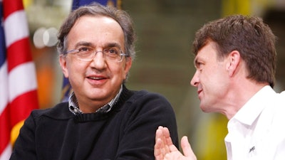 In this Friday, May 21, 2010 file photo, Chrylser CEO Sergio Marchionne, left, is seen with Jeep brand President and CEO Mike Manley at the Jefferson North Assembly Plant, in Detroit. Fiat Chrysler's board recommends Jeep executive Mike Manley to replace seriously ill CEO Sergio Marchionne, Saturday, July 21, 2018.