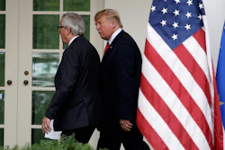 President Donald Trump and European Commission president Jean-Claude Juncker walk to the Oval Office after speaking in the Rose Garden of the White House.