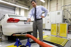 In this Sept. 30, 2015, file photo, John Swanton, spokesman with the California Air Resources Board, explains how a 2013 Volkswagen Passat with a diesel engine is evaluated at the emissions test lab in El Monte, Calif. A U.S. appeals court on Monday, July 9, 2018, approved a $10 billion settlement between Volkswagen and car owners caught up in the company's emissions cheating scandal.
