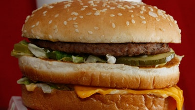 This Dec. 29, 2009 file photo shows a Big Mac hamburger at a McDonald's restaurant in North Huntingdon, Pa. The fast food restaurant is celebrating the sandwich's 50th anniversary in 2018.