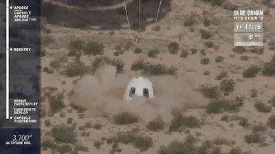 In this image from video made available by Blue Origin, the company's New Shepard capsule lands during a test in West Texas on Wednesday, July 18, 2018. Once its booster separated, the capsule’s escape motor fired, lifting the spacecraft to 74 miles (119 kilometers) as part of a safety system intended to save lives once customers -- including space tourists -- climb aboard for suborbital hops.
