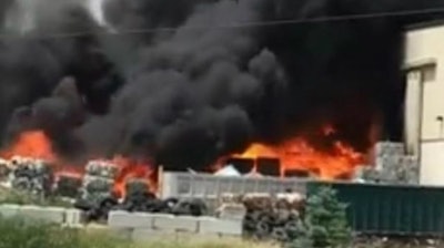 Fire burning at Wisconsin recycling plant.