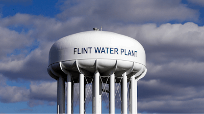 In this pMarch 21, 2016, file photo, the Flint Water Plant water tower is seen in Flint, Mich. A federal watchdog is calling on the U.S. Environmental Protection Agency to strengthen its oversight of state drinking water systems in the wake of the lead crisis in Flint, Michigan. In a report released July 19, 2018, the EPA’s Office of Inspector General says the agency must act now to be able to react more quickly in times of public-health emergencies.