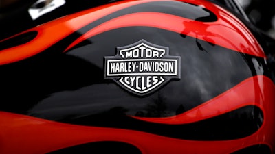 Harley-Davidson topped Wall Street expectations again on steady sales in Latin America, Europe, Middle East and Africa, though shipments slipped by 11 percent in the second quarter and the company warned that new EU tariffs would pressure operating margins.