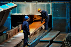 In this June 8, 2018, photo, a worker handles red hot steel cables at a steel factory in Qingdao in east China's Shandong province. The Trump administration on Monday, July 16, 2018, brought cases against China, the European Union, Canada, Mexico and Turkey at the World Trade Organization for retaliating against American tariffs on imported steel and aluminum.