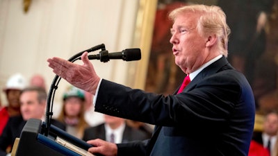 In this July 19, 2018 file photo, President Donald Trump speaks before signing an Executive Order that establishes a National Council for the American Worker during a ceremony in the East Room of the White House in Washington. Trump said he’s willing to hit all imported goods from China with tariffs, sending U.S. markets sliding before the opening bell, Friday, July 20. In a taped interview with the business channel CNBC, Trump said “I’m willing to go to 500,” referring roughly to the $505.5 in goods imported last year from China.