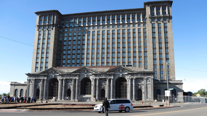 This Monday, June 11, 2018, photo shows the historic Michigan Central Station in Detroit. Ford Motor Co. said Tuesday, Aug. 14, 2018, it plans to spend roughly $740 million renovating Detroit's long vacant train depot and redeveloping other area properties for research and development of self-driving vehicles.