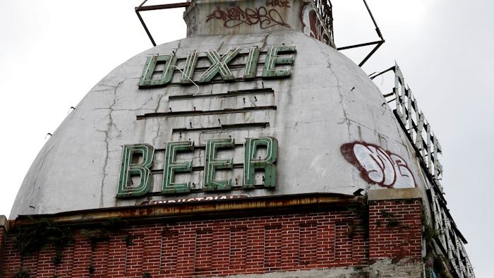 This Wednesday, July 3, 2013 file photo shows the top of the abandoned Dixie Beer brewery on Tulane Avenue in New Orleans. Nearly 13 years after Hurricane Katrina laid waste to the landmark brewery, plans have been announced for Dixie Beer to be brewed in New Orleans again.