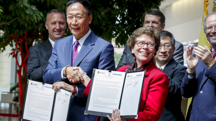 Foxconn CEO Terry Gou, left, and UW-Madison Chancellor Rebecca Blank after signing a Declaration of Collaboration agreement Monday Aug. 27, 2018 at the Wisconsin Institute for Discovery on the UW-Madison campus. Foxconn Technology Group announced Monday, that it will invest $100 million in engineering and innovation research at the University of Wisconsin-Madison, making it one of the largest gifts in the school's history that comes as the Taiwan-based electronics giant builds a factory in southeastern Wisconsin that would be the company's first of its kind in North America.