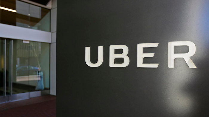 This March 1, 2017, file photo shows an exterior view of the headquarters of Uber in San Francisco. Toyota will sink a half-billion dollars into Uber and work jointly with the ride-hailing giant to develop self-driving vehicles, a person briefed on the matter said Monday, Aug. 27, 2018.