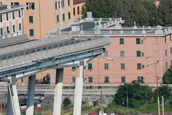 A view of the collapsed Morandi highway bridge, in Genoa, Italy, Sunday, Aug. 19, 2018. The unofficial death toll in Tuesday's collapse rose to 43 Saturday.