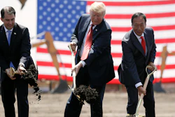 In this June 28, 2018, file photo, President Donald Trump, center, along with Wisconsin Gov. Scott Walker, left, and Foxconn Chairman Terry Gou participate in a groundbreaking event for the new Foxconn facility in Mt. Pleasant, Wis. To make the next generation of liquid crystal display technology, Foxconn Technology Group will draw talent from beyond the borders of Wisconsin, partner with universities and technical schools and even tap into transitioning members of the military to find the 13,000 workers it eventually expects to hire.