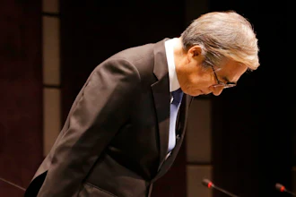 BMW Korea Chairman Kim Hyo-joon bows during a press conference in Seoul, South Korea, Monday, Aug. 6, 2018. BMW AG's Korean unit apologized over engine fires that prompted recalls and a probe Monday, in its latest efforts to contain the damage as images of the German cars engulfed in flames stoked safety worries.
