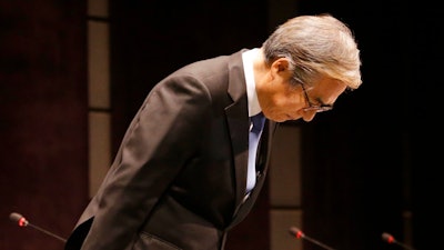 BMW Korea Chairman Kim Hyo-joon bows during a press conference in Seoul, South Korea, Monday, Aug. 6, 2018. BMW AG's Korean unit apologized over engine fires that prompted recalls and a probe Monday, in its latest efforts to contain the damage as images of the German cars engulfed in flames stoked safety worries.