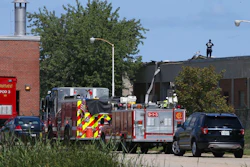 Fire crews are responding to a report of people trapped inside the Calumet Water Reclamation Plant after a fire and possible explosion caused part of the building's roof to collapse, on the Far South Side of Chicago, Thursday, Aug. 30, 2018.