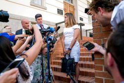 Canadian Foreign Affairs Minister Chrystia Freeland speaks to members of the media as she arrives at the Office Of The United States Trade Representative, Tuesday, Aug. 28, 2018, in Washington. Canada, America's longtime ally and No. 2 trading partner, was left out of a proposed deal Trump just reached with Mexico and is scrambling to keep its place in the regional free-trade bloc — and fend off the threat of U.S. taxes on its vehicles.