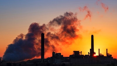 In this July 27, 2018 photo, the Dave Johnson coal-fired power plant is silhouetted against the morning sun in Glenrock, Wyo. The Trump administration on Tuesday proposed a major rollback of Obama-era regulations on coal-fired power plants, striking at one of the former administration’s legacy programs to rein in climate-changing fossil-fuel emissions.