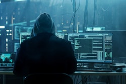 Dangerous Hooded Hacker Breaks Into Government Data Servers And Infects Their System With A Virus His Hideout Place Has Dark Atmosphere, Multiple Displays, Cables Everywhere 817486228 2313x1301 (1)