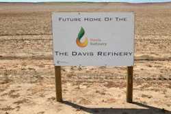 This July 19, 2018, file photo, shows a sign on property, near southwest Belfield, N.D, for the future home of the Davis Refinery near Theodore Roosevelt National Park. Opponents of an oil refinery planned near Theodore Roosevelt National Park in North Dakota are imploring state regulators to give them a chance to explore whether the developer is being truthful about the project's size. Meridian Energy Group maintains it doesn't need a state siting permit because the $800 million Davis Refinery won't have a big enough capacity.