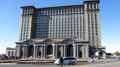 This Monday, June 11, 2018, photo shows the historic Michigan Central Station in Detroit. Ford Motor Co. said Tuesday, Aug. 14, 2018, it plans to spend roughly $740 million renovating Detroit's long vacant train depot and redeveloping other area properties for research and development of self-driving vehicles.
