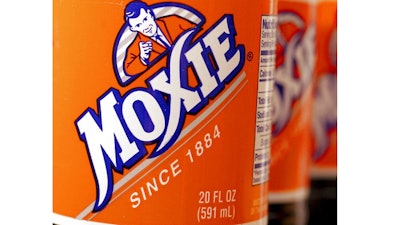 In this May 27, 2005 file photo, bottles of the soft drink Moxie are pictured in West Bath, Maine. Soft drink giant Coca-Cola said Tuesday, Aug. 28, 2018, it is acquiring Moxie, a beloved New England soda brand that is the official state beverage of Maine.