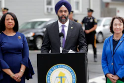 New Jersey Attorney General Gurbir Grewal, center, stands with Lt. Gov. Sheila Oliver, left, and state Environmental Protection Commissioner Catherine McCabe during a news conference announcing pollution lawsuits filed by the state, Wednesday, Aug. 1, 2018, in Newark, N.J. Grewal said it's the largest single-day action the state has taken in at least a decade and the first new natural resources damages case since 2008. He said he didn't have an estimate for what the state might recover financially but said the cases could take a long time to prosecute. The cases include two sites in Newark, two in Woodbridge and one each in Atlantic City and Warren County.