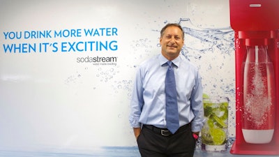 In this Sept. 2, 2015 file photo, Sodastream CEO Daniel Birnbaum poses for a photograph at the SodaStream factory near the Bedouin city of Rahat, Southern Israel. Beverage giant PepsiCo has bought Israel's fizzy drink maker SodaStream for $3.2 billion. PepsiCo said on Monday, Aug. 20, 2018, that it is acquiring all SodaStream's outstanding shares at $144 per share, a 32 percent premium to the 30-day volume weighted average price.