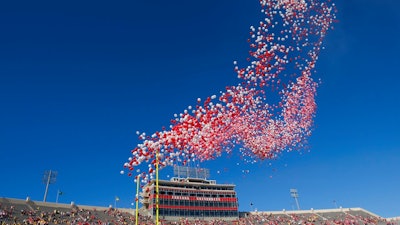 In this Oct. 14, 2017, file photo balloons are released in Memorial Stadium before an NCAA college football game between Indiana and Michigan in Bloomington, Ind. The celebration of releasing balloons into the air has long bothered environmentalists, who say the pieces that fall back to earth can be deadly to seabirds and turtles that eat them. So as companies vow to banish plastic straws, there are signs balloons are among the products getting more scrutiny.