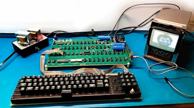This August 2018 photo provided by RR Auctions shows a vintage Apple Computer. This Apple-1, which will be auctioned in September 2018, is one of about 60 remaining models of the original 200 that were designed and built by Steve Jobs and Steve Wozniak in 1976 and 1977.