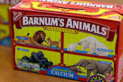This Monday, Aug. 20, 2018, photo shows boxes of Nabisco's Barnum's Animals crackers in Chicago. After more than a century behind bars, the beasts on boxes of animal crackers are roaming free. The new boxes retain their familiar red and yellow coloring and prominent 'Barnum's Animals' lettering. But instead of showing the animals in cages, implying that they're traveling in boxcars for the circus, the new boxes feature a zebra, elephant, lion, giraffe and gorilla wandering side-by-side in a grassland.