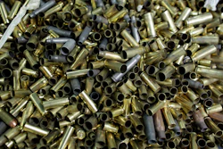 In this Jan. 5, 2016 file photo, empty bullet casings sit in a container at the National Armory gun store and gun range in Pompano Beach, Fla. A U.S. appeals court has upheld a California law that requires new models of semi-automatic handguns to stamp identifying information on bullet casings to help solve crimes. The 9th U.S. Circuit Court of Appeals in a 2-1 decision on Friday, Aug. 3, 2018 said the stamping requirement and two measures intended to make guns safer did not violate the 2nd Amendment.