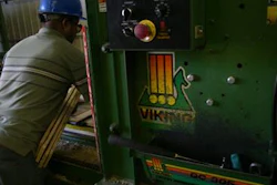 A photo of a worker at Calumet Pallet taken in 2013.