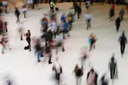 In this June 15, 2017, photo, people walk inside the Oculus, the new transit station at the World Trade Center in New York. Data collection practices of tech firms are increasingly under the microscope. An Associated Press investigation shows that using Google services on Android devices and iPhones allows the search giant to record your whereabouts as you go about your day.