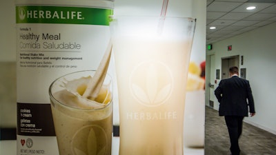This May 11, 2016, file photo shows an area of the Herbalife corporate office in Los Angeles. Some distributors who claim they were duped by Herbalife’s promises they’d get rich selling health and personal care products are suing the company for as much as $1 billion in damages.