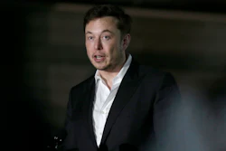 In this June 14, 2018, file photo Tesla CEO and founder of the Boring Company Elon Musk speaks at a news conference in Chicago. Musk says he's in talks with the Saudi Arabian sovereign wealth fund about taking the electric car and solar panel maker private, but no deal has been finalized. Musk says in a blog posted Monday, Aug. 13, that most of the funding would be in stock rather than debt.