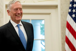 In this July 30, 2018, file photo, Defense Secretary Jim Mattis attends a swearing in ceremony for Robert Wilkie as Secretary of the Department of Veterans Affairs in the Oval Office of the White House in Washington. President Donald Trump wants a Space Force, a new military service he says is needed to ensure American dominance in space. But the idea is falling flat at the Pentagon, where Mattis has said it would add burdensome bureaucracy and costs.