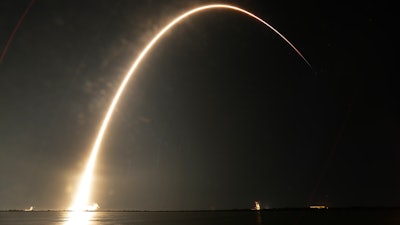 A Falcon 9 SpaceX rocket lifts off from the Cape Canaveral Air Force Station Complex 40 launch pad as seen through a time exposure in Cape Canaveral, Fla., Tuesday, Aug. 7, 2018. The payload, named Merah Putih, is a geostationary commercial communications satellite.