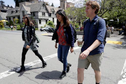 University of California students, from left, Anjali Banerjee, Alice Ma and Tyler Heintz walk near the university's campus Wednesday, June 6, 2018, in, Berkeley, Calif. The students who were in Nice, France when a terrorist drove a truck down a promenade killing 83 people, including one of their classmates, have channeled their grief and anger into two nonprofits to fight terrorism.