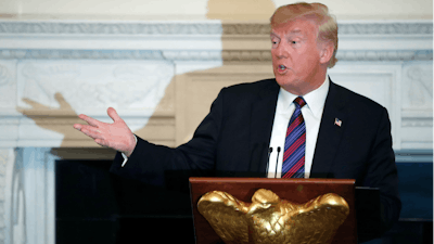 President Donald Trump speaks during a dinner for evangelical leaders in the State Dining Room of the White House, Monday, Aug. 27, 2018, in Washington.