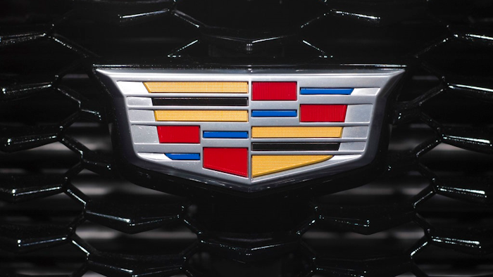 In this March 27, 2018, file photo the Cadillac emblem is shown on the from grill of its XT4 at the New York Auto Show. General Motors is moving its Cadillac brand headquarters from New York City back to Michigan, to bring workers closer to designers.