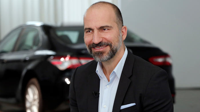Uber CEO Dara Khosrowshahi listens during an interview after the company's unveiling of the new features in New York, Wednesday, Sept. 5, 2018. Uber is aiming to boost driver and passenger safety in an effort to rebuild trust in the brand.