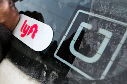 In this Jan. 31, 2018, file photo, a Lyft logo is installed on a Lyft driver's car next to an Uber sticker in Pittsburgh. The “gig” economy might not be the new frontier for America’s workforce after all. From Uber to Lyft to TaskRabbit to YourMechanic, so-called gig work has been widely seen as ideally suited for people who want the flexibility and independence that traditional jobs don’t offer. Yet the evidence is growing that over time, they don’t deliver the financial returns many expect.